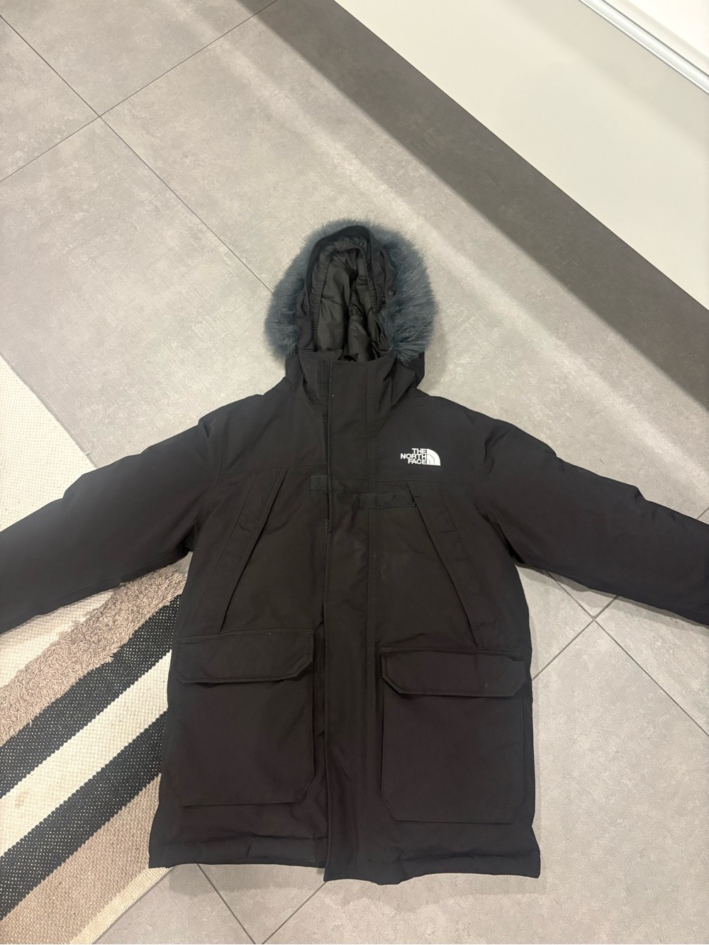 The North Face kids Black Insulated Parka with Faux Fur Hood